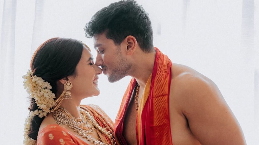 Kalidas Jayaram kisses Tarini Kalingarayar in adorable first pics after marriage