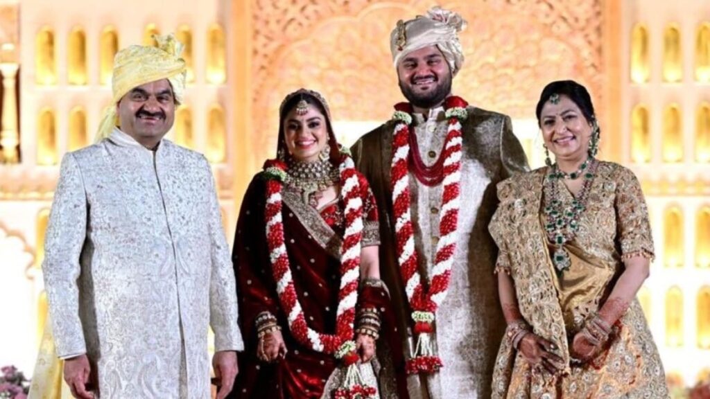 Gautam Adani’s son Jeet Adani weds Diva Shah: Bride upholds traditions in regal ivory red lehenga, groom wears sherwani | Fashion Trends
