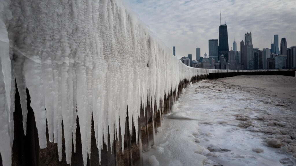 Polar vortex brings ‘life-threatening’ cold to US after deadly floods | Photos