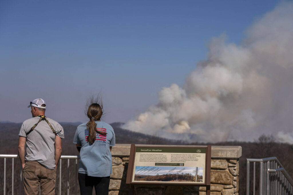 Carolina wildfires wreak havoc as hundreds urged to leave their homes | See photos