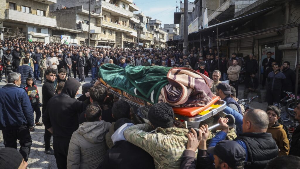 Corpses on roads, women paraded naked in Syrian revenge violence