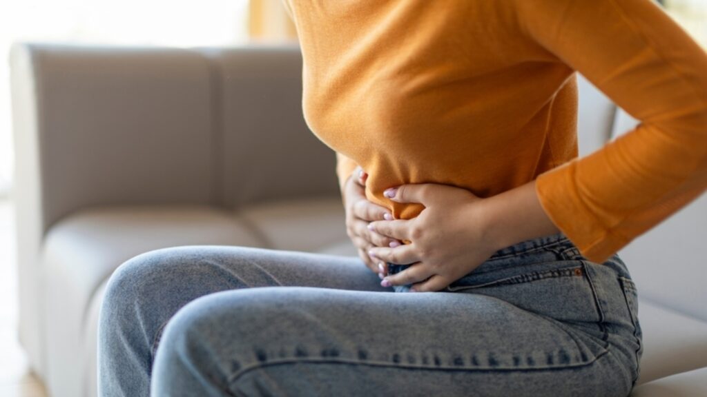 Facing abdominal pain? Know these abdominal symptoms and their link to cancer
