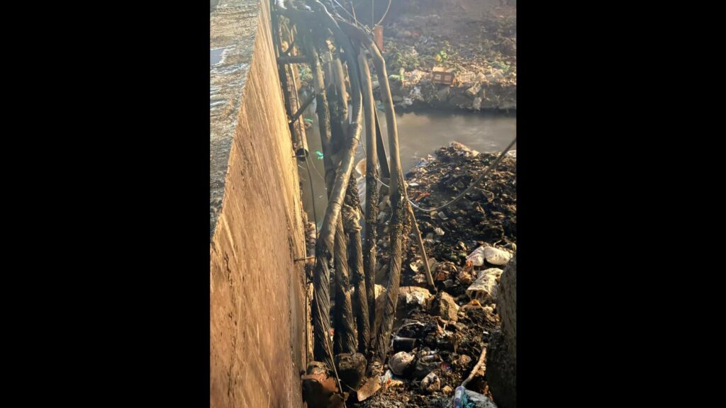 Garbage fire near power line causes outage in Navale Bridge area