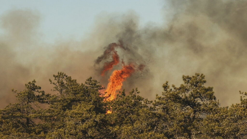 Photos: New York Long Island wildfires prompt highway closures, state of emergency
