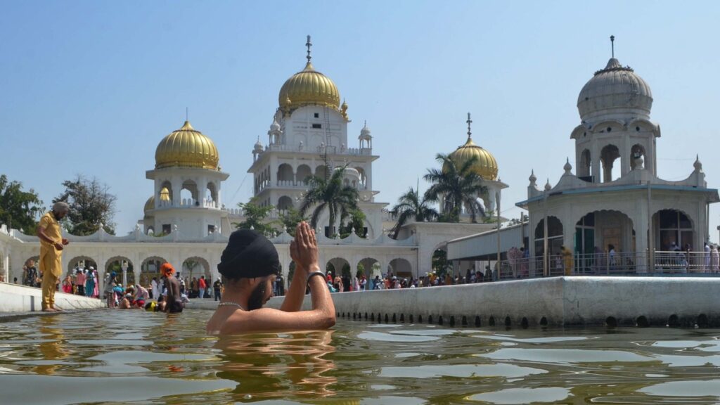 Baisakhi 2025 celebration: Devotees take dips and offer prayers on this auspicious day. See pics
