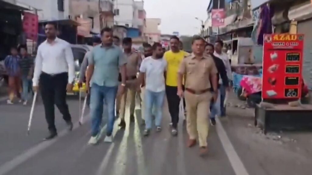 Man facing nearly 30 criminal cases arrested, paraded by police in Pune | Latest News India