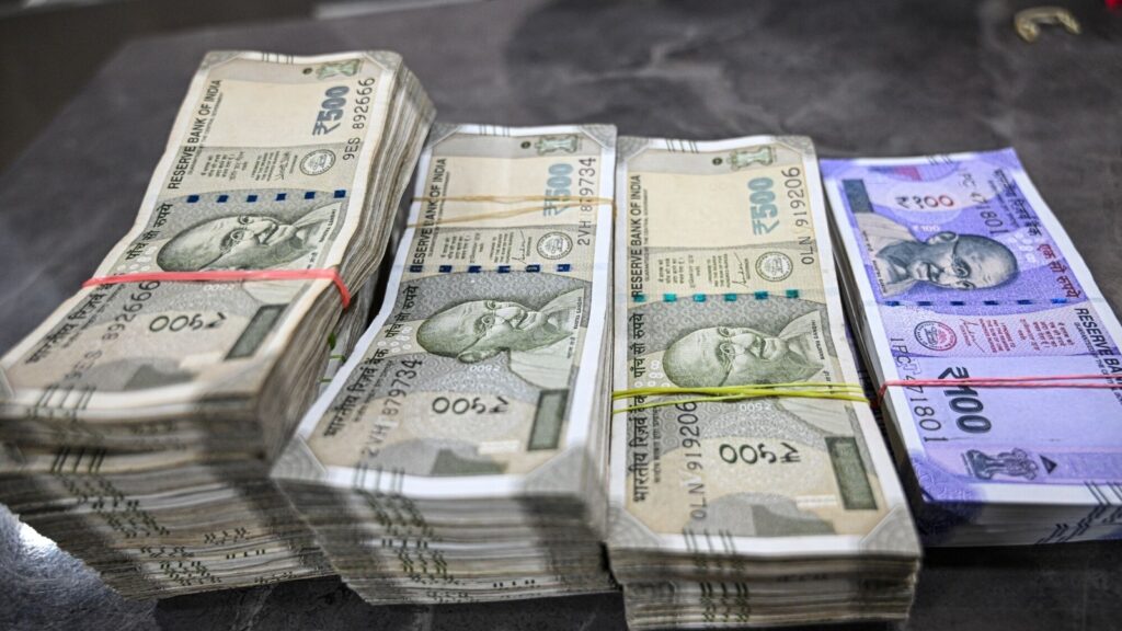 Rupee falls by 19 paise to 85.63 against the US dollar in early trade amid stock market crash