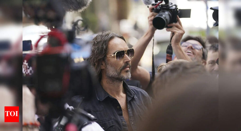 UK comedian Russell Brand arrives at court to face rape charges