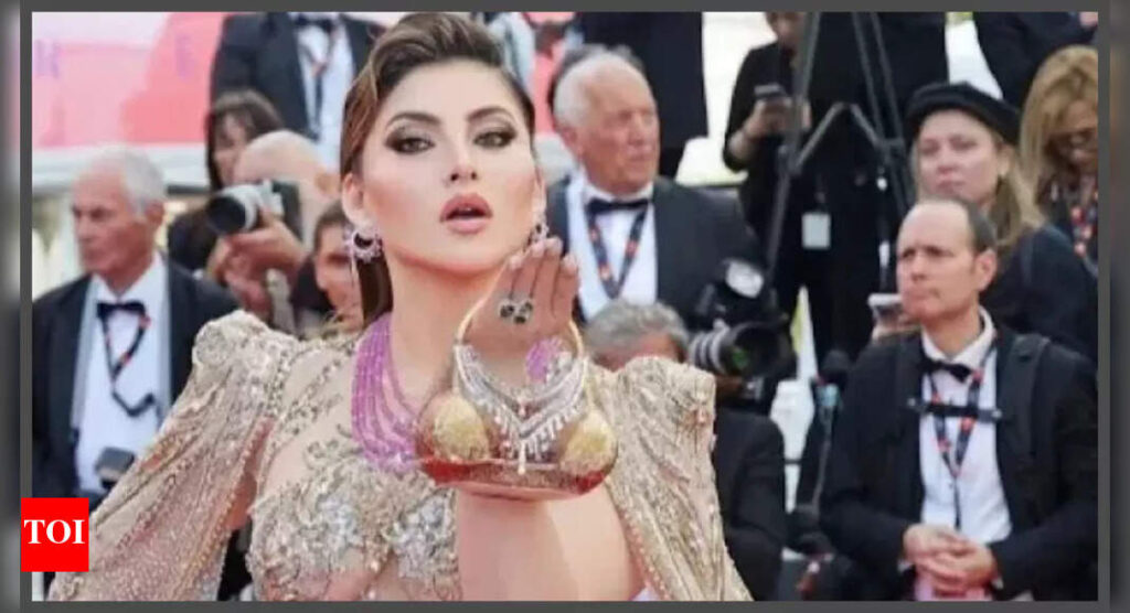 After her parrot clutch, Urvashi Rautela makes heads turn with her bikini gold and diamond bag worth Rs 5.29 lakh at Cannes – See photos |