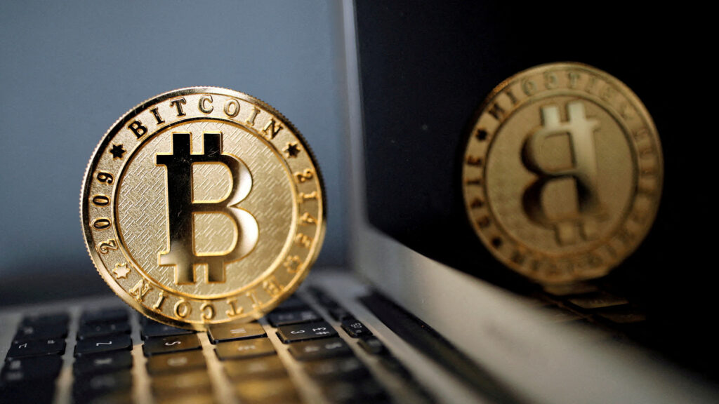 Bitcoin hits record high, crosses 1,000 mark for first time as US optimism lifts crypto