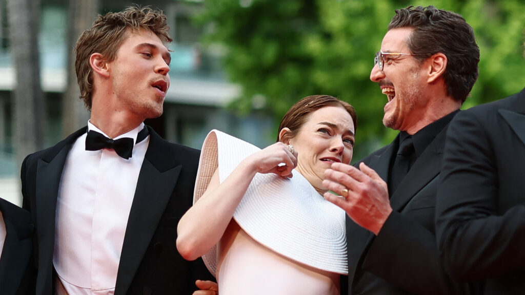 Emma Stone and Eddington cast battle a bee in a Cannes Film Festival red carpet moment to remember. Watch | Hollywood