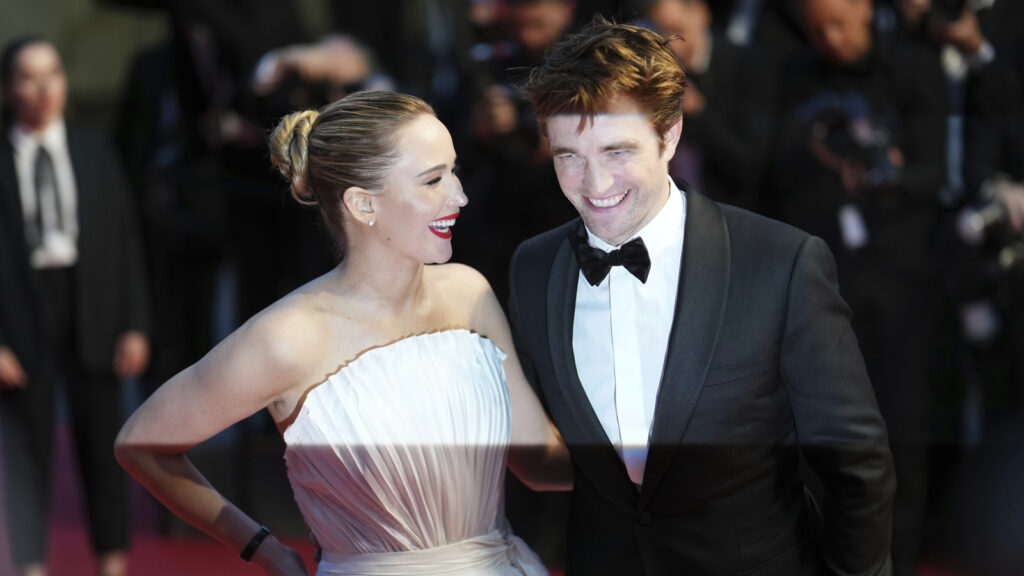 Hunger Games meets Twilight at Cannes: Jennifer Lawrence in an ivory gown with Robert Pattinson in tuxedo look great | Fashion Trends