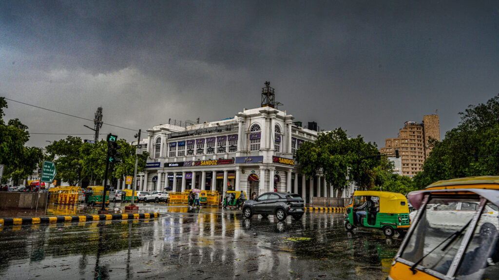 Rain hits Delhi-NCR, gusty winds uproot trees in some areas | Pics