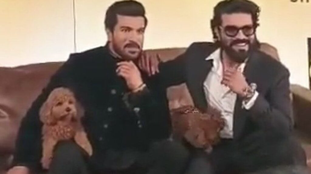 Ram Charan recreates pose with his Madame Tussauds wax statue; his pet dog Rhyme looks adorably bamboozled. Watch