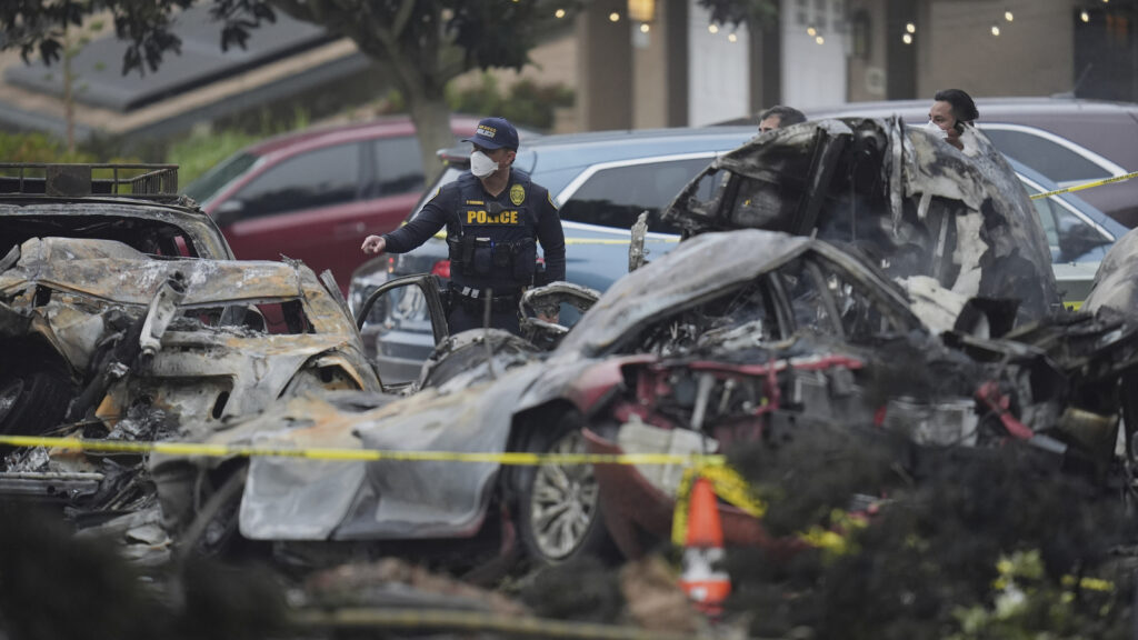 San Diego plane crash: Harrowing photos show ‘gigantic debris field’ of burnt up houses, cars