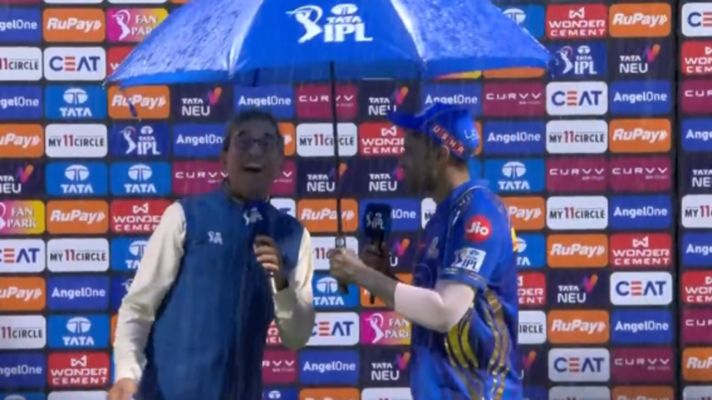 Suryakumar Yadav holds umbrella for broadcaster in unusual post-match scenes as rain disrupts presentation ceremony
