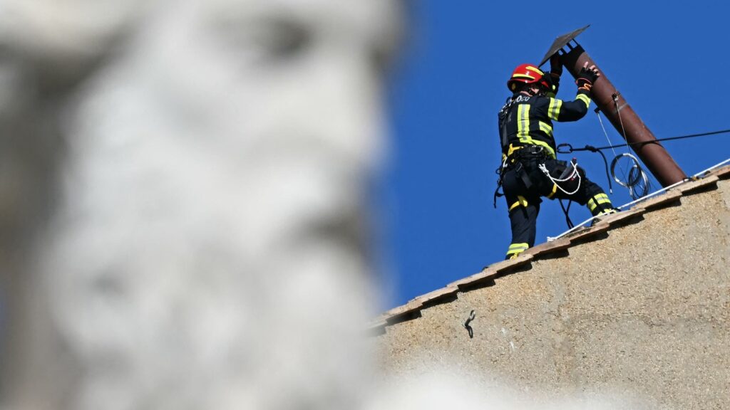 Vatican chimney installed ahead of papal conclave | World News