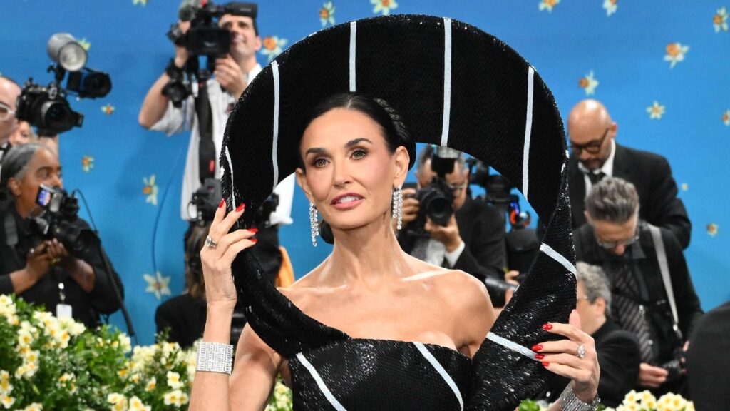 ‘World’s most beautiful woman’ Demi Moore brings the drama at Met Gala with huge neck tie dress | Fashion Trends